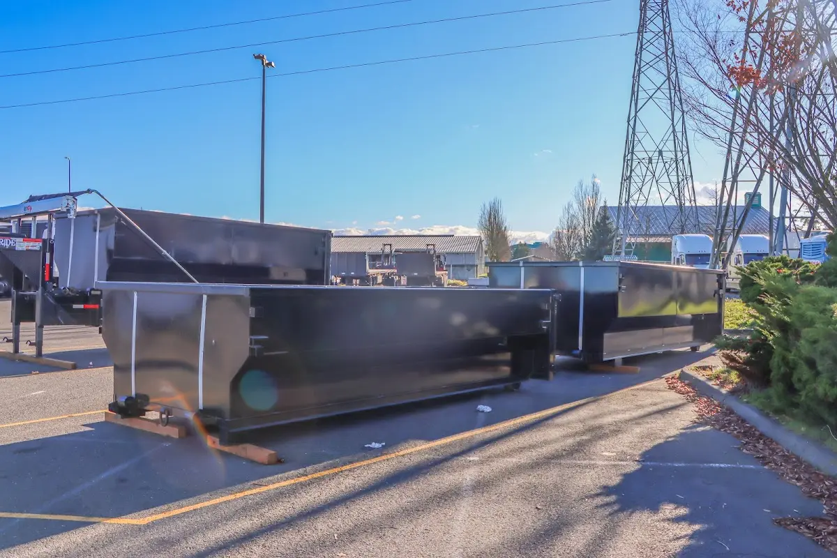 Roll-off dumpster ready for waste disposal at job site for Demolition Dumpster Rental in Rahway